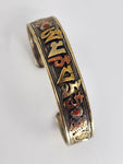 Mantra wrist cuff multi red stone