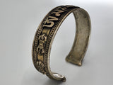 Mantra wrist cuff