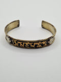 Mantra wrist cuff