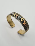 Mantra wrist cuff multi